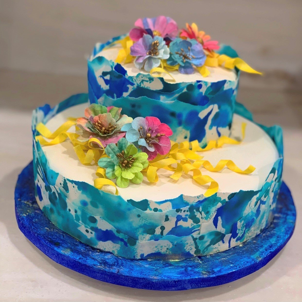 Even though sapphire is associated with the month of September, join Kim in making a springtime sapphire cake this month.